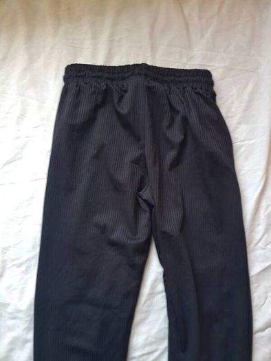 Nike bottoms Black polyester size medium 28" leg in new condition