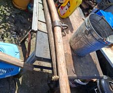 This Antique 19th Century Wooden Single Tree used to connect a Horse or Ox to Farm Equipment. The item features handmade wooden construction with blacksmith-forged iron hook