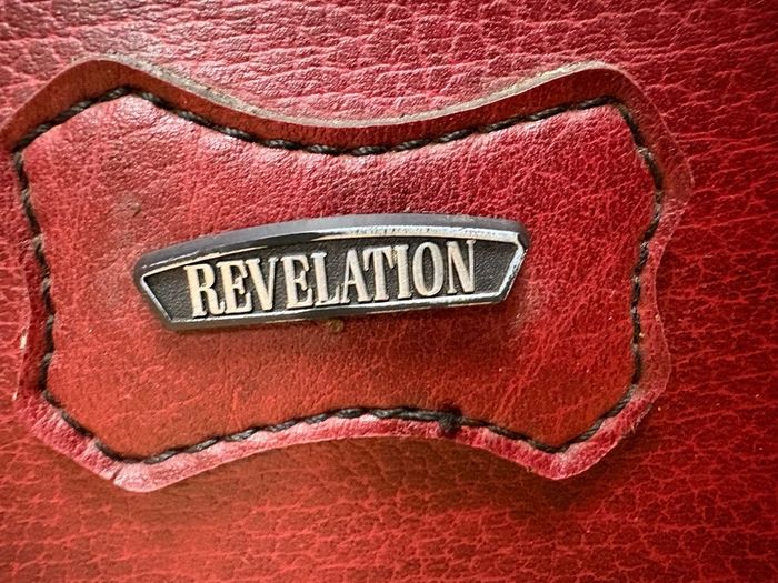 Vintage burgundy faux-leather suitcase