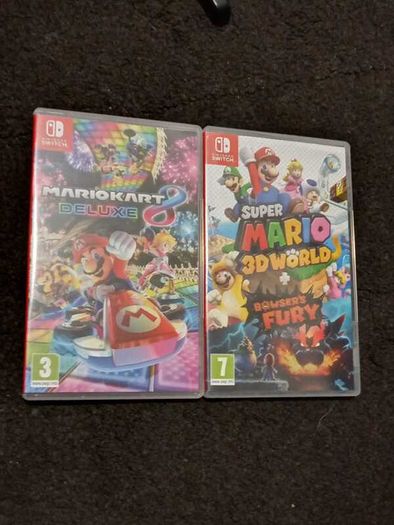 Nintendo Switch + games + 2 joy cons