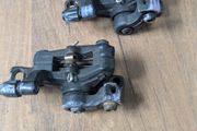 Radius disc brake calipers
