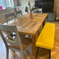 solid oak dining table and chairs
