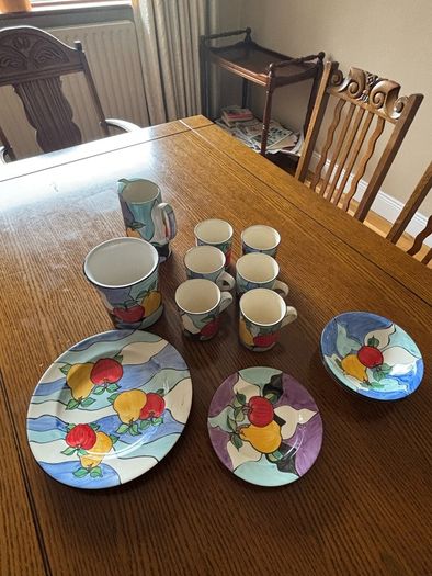 Colourful hand made pottery mugs set