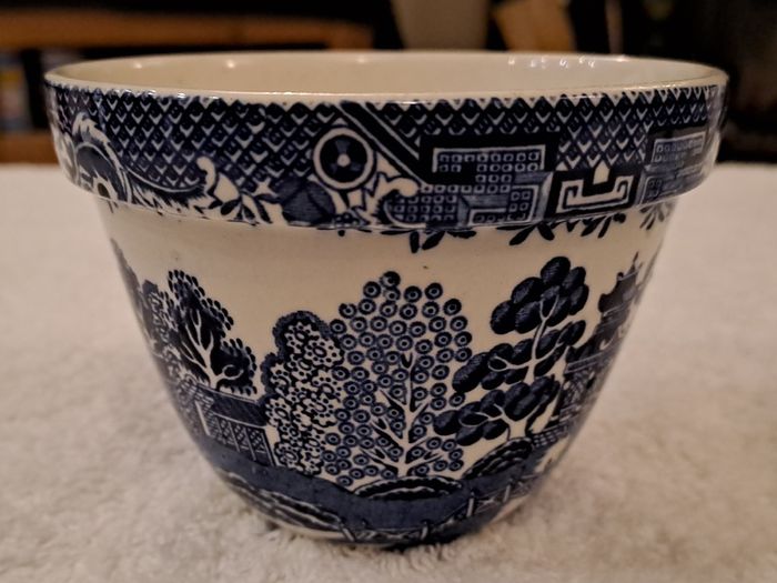 Antique blue and white willow pattern