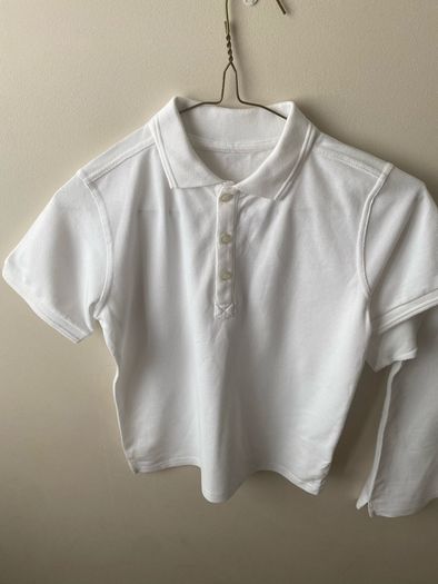 2 dunnes white polo shirts (as new) age 9-10