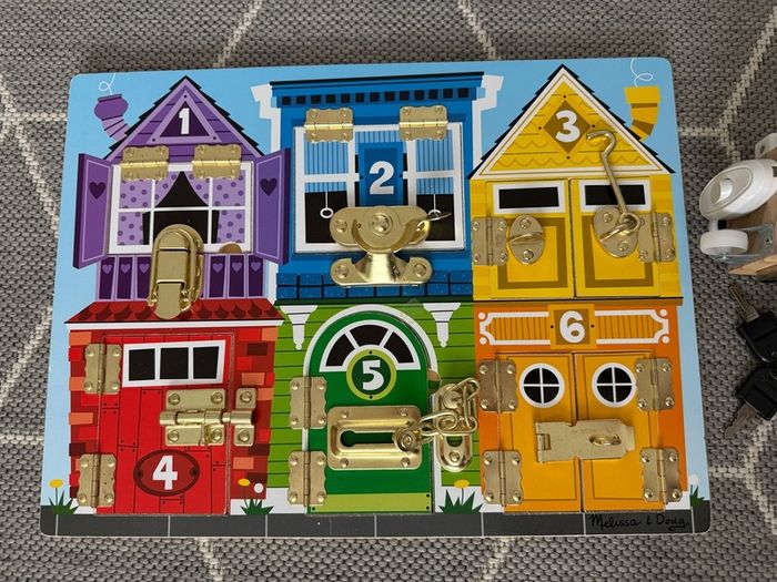 Melissa & Doug Busy Board and non branded busy cube
