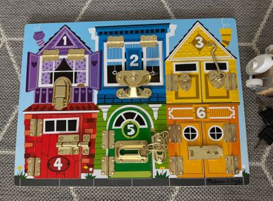 Melissa & Doug Busy Board and non branded busy cube