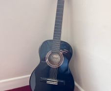 Valencia left-handed acoustic guitar and bag