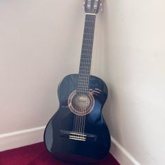 Valencia left-handed acoustic guitar and bag