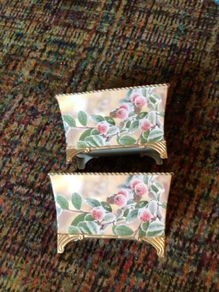 2 beautiful vintage decorative painted metal planters with legs.