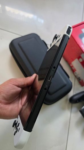 Nintendo Switch Oled + extras