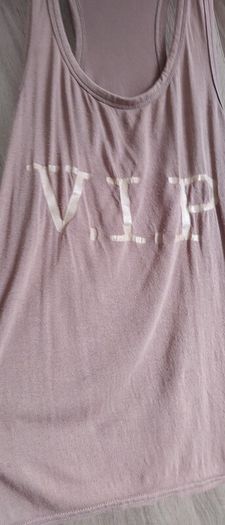 VIP tank top fits size  8/10