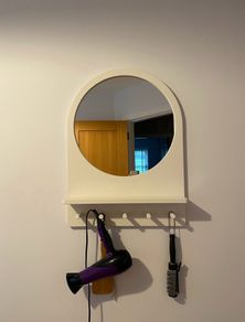 Mirror with hooks
