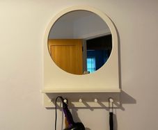 Mirror with hooks