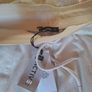 Trousers label still on Image 2