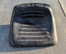 Old ride on lawn mower seat.