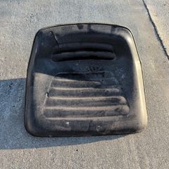 Old ride on lawn mower seat.