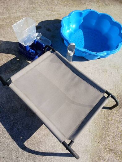 Dog raised bed and paddling pool