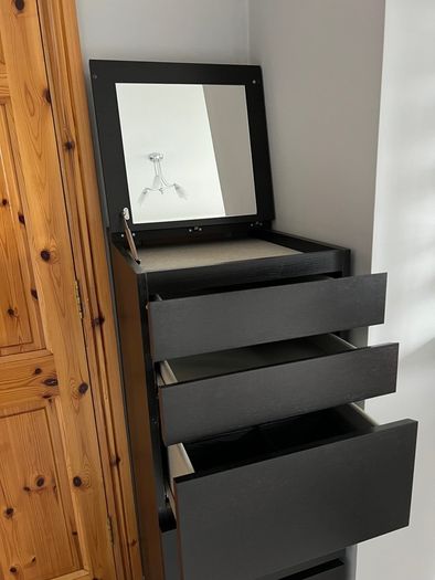 Chest of drawers with mirror