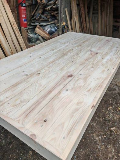 Rustic kitchen island with triple overhang