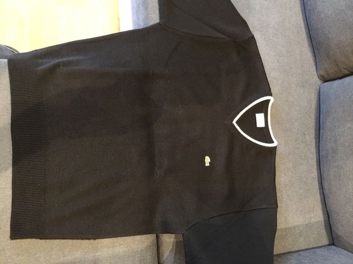 Lacoste knitwear size Large for men.