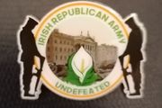 Irish Republican Army Undefeated pin badge.