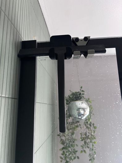 Bathroom toilet roll holder, bin and shower door squeegee
