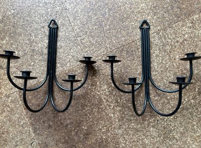 Pair of black metal wall sconces