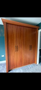 Fitted wardrobe with internal drawers