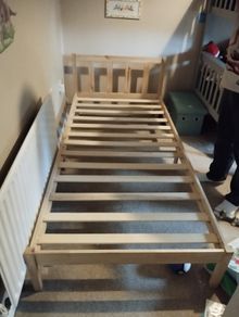 2 x wooden single beds