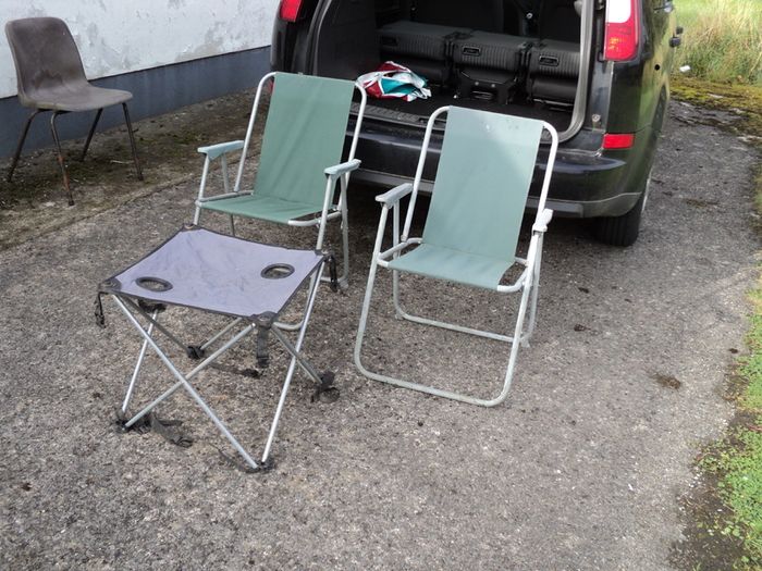 Deck chairs and folding table .