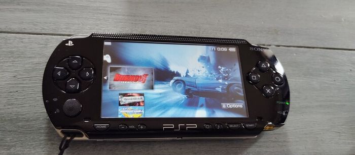 Psp 1000 Modded 64gb 40 psp original charger 2 Batteries Excellent condition