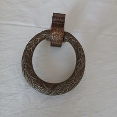 Antique brass door knocker.