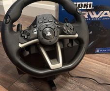PS4 Racing Wheel Apex And Pedals. Brand New Condition  Very lightly used- maybe 6-10 times in total. Everything included.  Perfect condition with Box- PS4, PS3 And PC