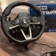 PS4 Racing Wheel Apex And Pedals. Brand New Condition  Very lightly used- maybe 6-10 times in total. Everything included.  Perfect condition with Box- PS4, PS3 And PC
