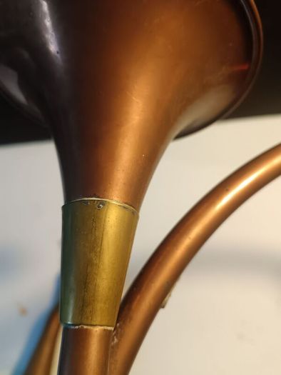 A Pair of Copper and Brass Horns