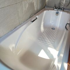 Bath with taps - shower head