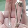 Vintage sterling silver bracelet with a rose-shaped clasp. Image 2