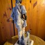 Vintage Sculpture of an Elegant Lady with a Dog Image 10