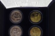 The VE and VJ Commemorative (4) Coin Set - The World At War Commemorative Set - 1995