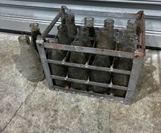 Milk bottles and crate