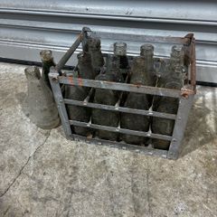 Milk bottles and crate