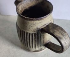 Tremar U.K water jug hand made pottery.