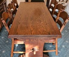 Hardwood dining table and six chairs