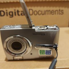 OLYMPUS Digital Camera Model FE-140, 6 Megapixel, takes 2 Double A Batteries, Has 512mb SD Card, Works perfect