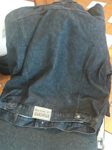 Denim jeans jacket. new. size Large.