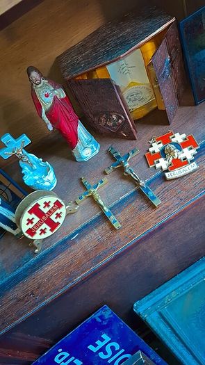 Antique holy statue and pictures