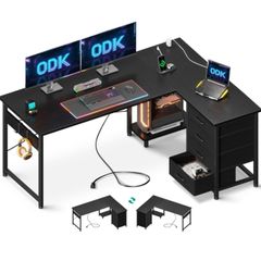 Corner Desk with Drawers, L Shaped Computer Desk, 135 x 100 cm, Black  Reversible Office Desk with Power Outlets & USB Ports, PC Work Desk with Storage, Host Stand & Hooks, Home Office and Gaming