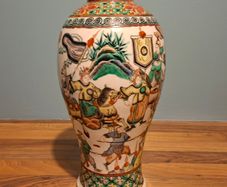 A late 19th century Chinese large famille verte vase, decorated with Chinese figures 32cm