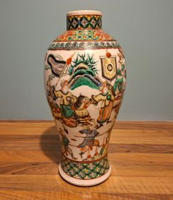 A late 19th century Chinese large famille verte vase, decorated with Chinese figures 32cm